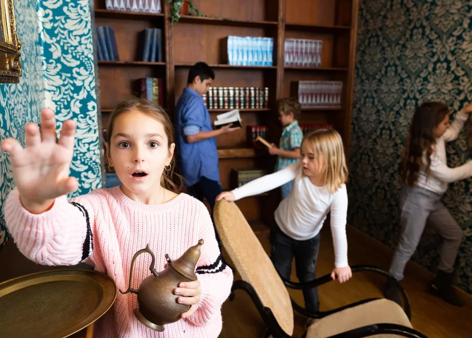 Young children playing in a kids escape room